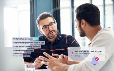 Manager and employee discussing development.