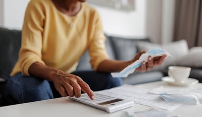 Woman doing her budgeting for the week.