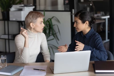 Performance review meeting between manager and employee