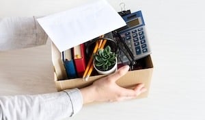 image of an employees hands holding a box